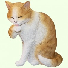 Садовая фигурка Кот лижет лапу рыжий